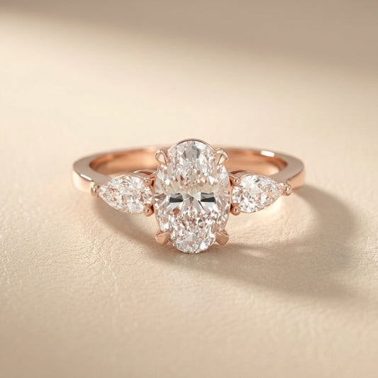 Oval Cut Lab Grown Diamond Three Stone Engagement Ring in Rose Gold setting