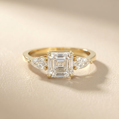 Asscher Cut Lab Grown Diamond Three Stone Engagement Ring in Yellow Gold setting