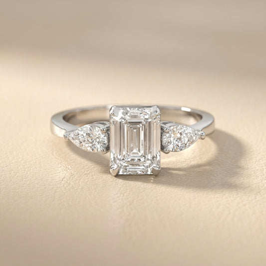 Grace Three Stone Emerald Cut Lab Grown Diamond Engagement Ring set in White Gold