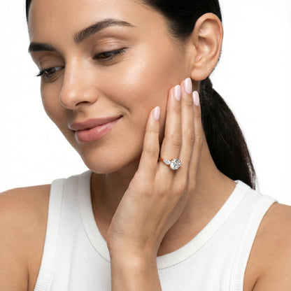 Round cut lab grown diamond three stone engagement ring in rose gold setting