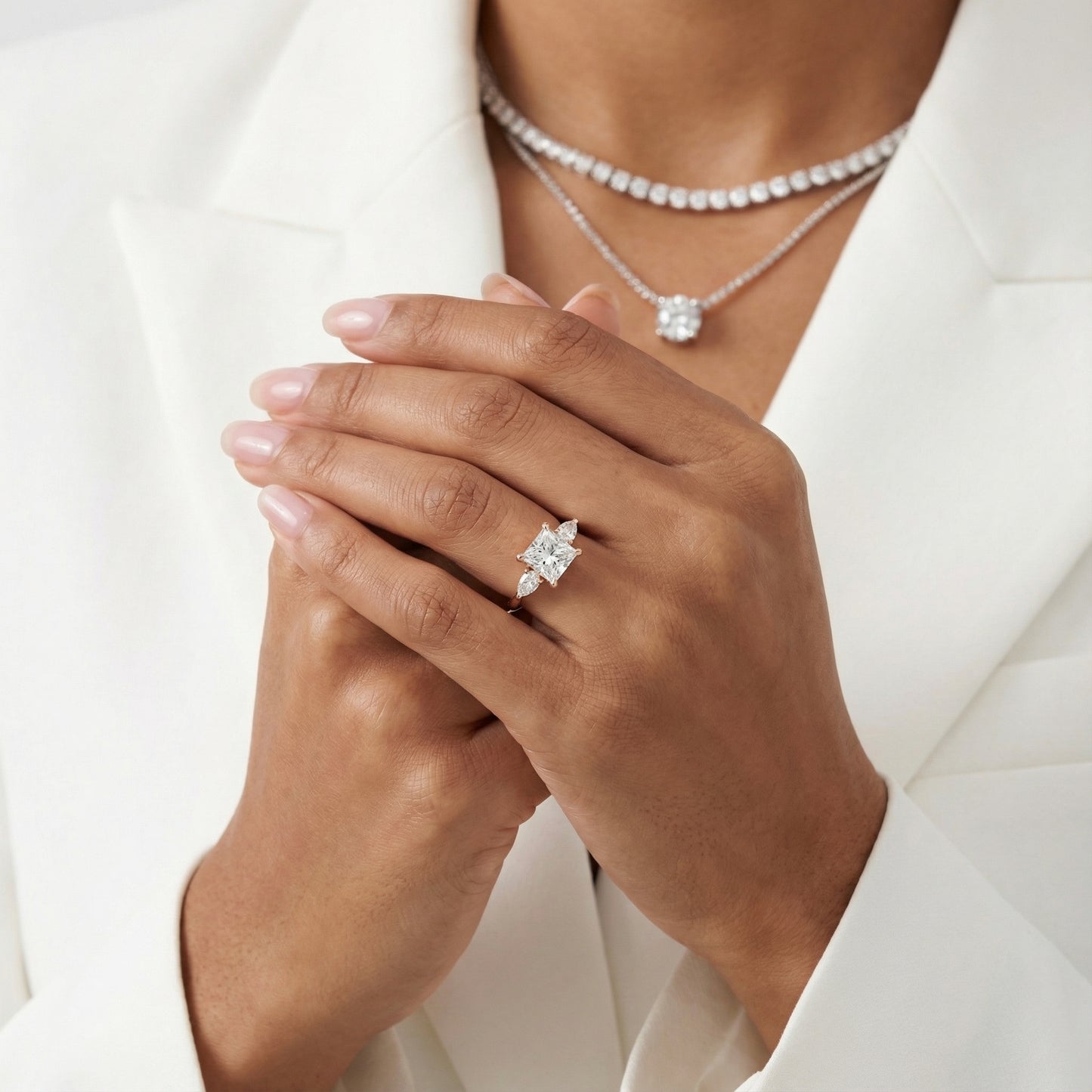 Princess Cut Lab Grown Diamond Three Stone Engagement Ring in Rose Gold with pear side stones