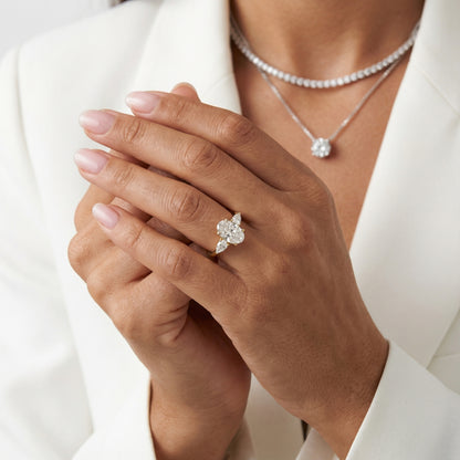 Oval Cut Lab Grown Diamond Three Stone Engagement Ring in Yellow Gold