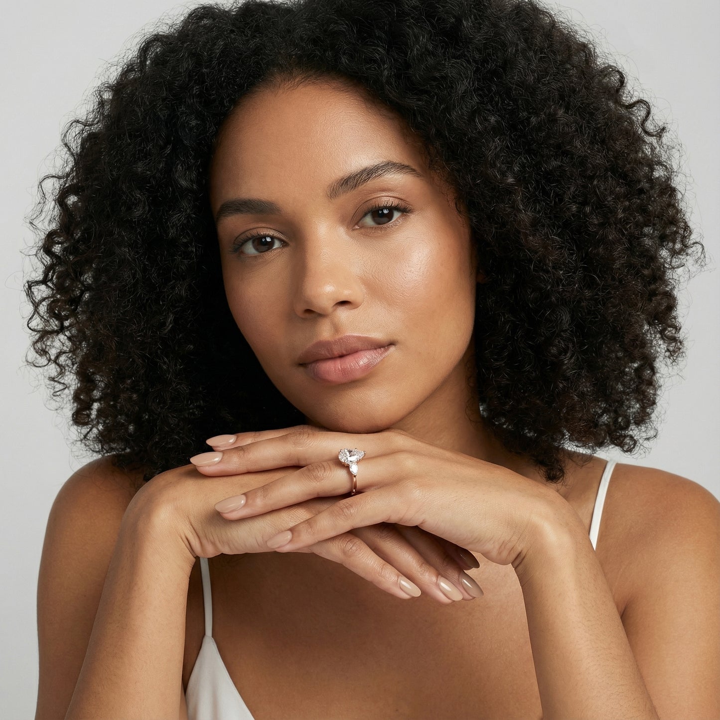 Pear Cut Lab Grown Diamond Three Stone Engagement Ring in Rose Gold