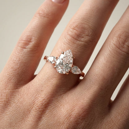 Pear Cut Lab Grown Diamond Three Stone Engagement Ring in Rose Gold
