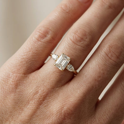 Grace Three Stone Emerald Cut Lab Grown Diamond Engagement Ring set in Yellow Gold