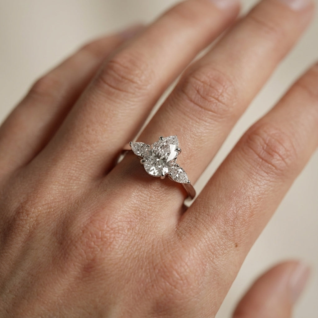 Pear Cut Lab Grown Diamond Three Stone Engagement Ring in Silver