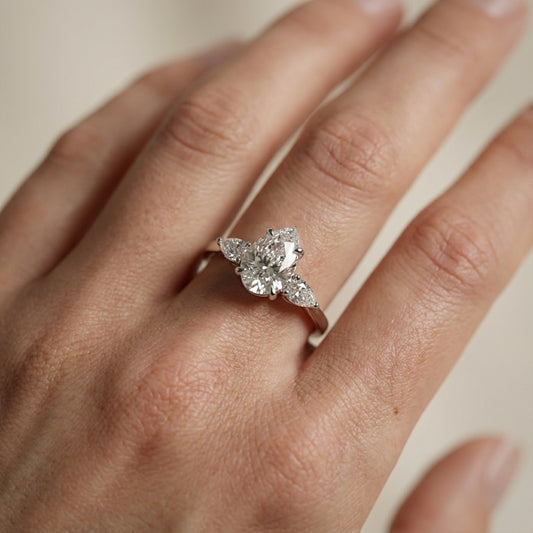 Pear Cut Lab Grown Diamond Three Stone Engagement Ring in Platinum