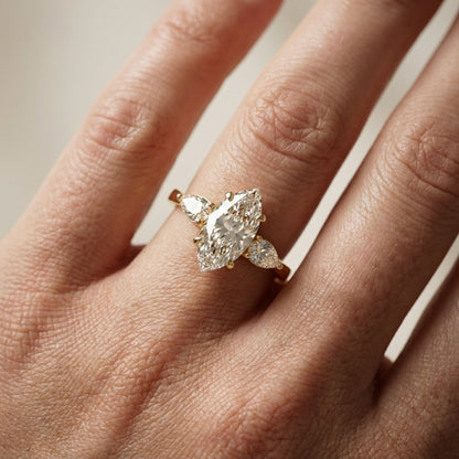 Grace Three Stone Marquise Cut Lab Grown Diamond Engagement Ring in Yellow Gold