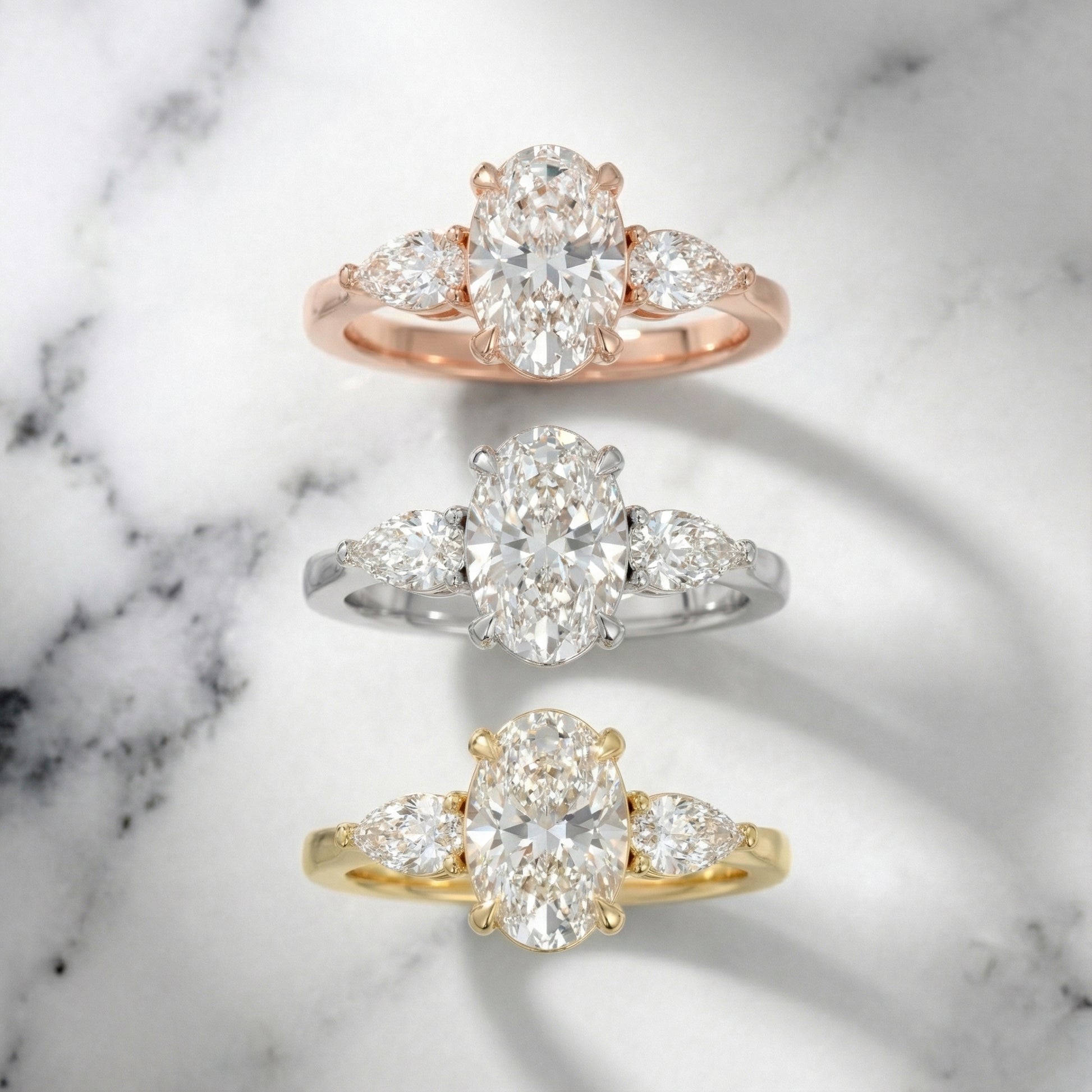 Oval Cut Lab Grown Diamond Three Stone Engagement Ring in Rose Gold setting