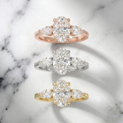 Oval Cut Lab Grown Diamond Three Stone Engagement Ring in Yellow Gold