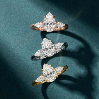 Pear Cut Lab Grown Diamond Three Stone Engagement Ring in Yellow Gold