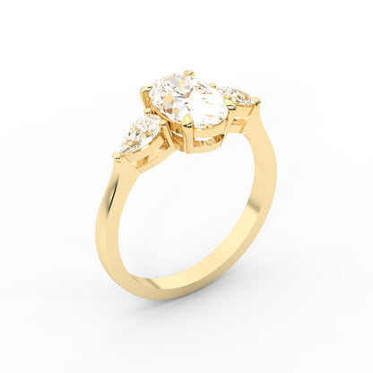 Oval Cut Lab Grown Diamond Three Stone Engagement Ring in Yellow Gold