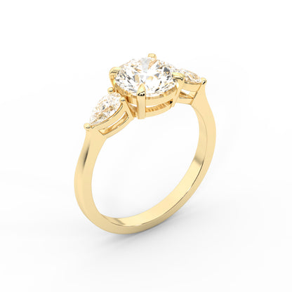 Round cut lab grown diamond three stone engagement ring in yellow gold setting