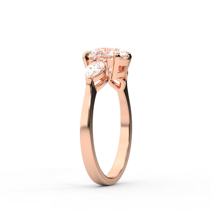 Round cut lab grown diamond three stone engagement ring in rose gold setting