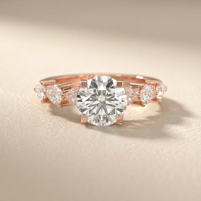 Round Cut Lab Grown Diamond Engagement Ring in Rose Gold with Marquise and Pear Side Stones