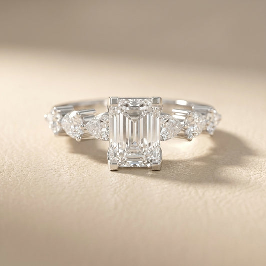 Emerald Cut Lab Grown Diamond Engagement Ring with Marquise and Pear Side Stones in Platinum