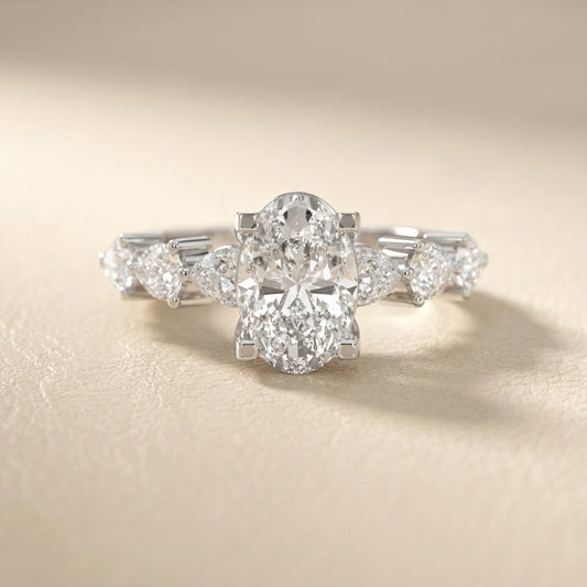 Oval Cut Lab Grown Diamond Engagement Ring with Marquise and Pear Side Stones in Platinum