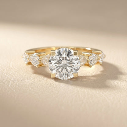 Round Cut Lab Grown Diamond Engagement Ring in Yellow Gold with Marquise and Pear Side Stones