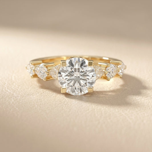 Round Cut Lab Grown Diamond Engagement Ring in Yellow Gold with Marquise and Pear Side Stones