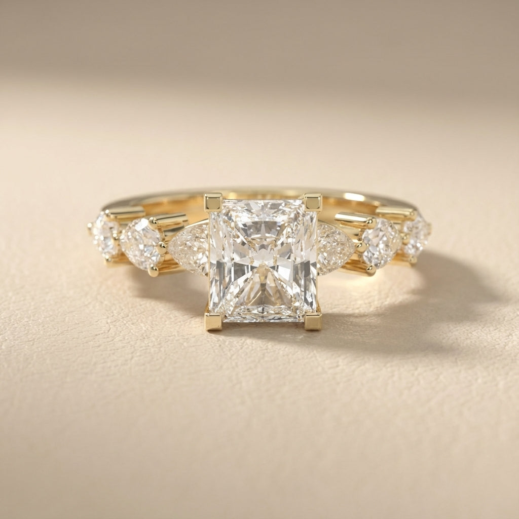 Radiant Cut Lab Grown Diamond Engagement Ring with Marquise and Pear Side Stones in Yellow Gold