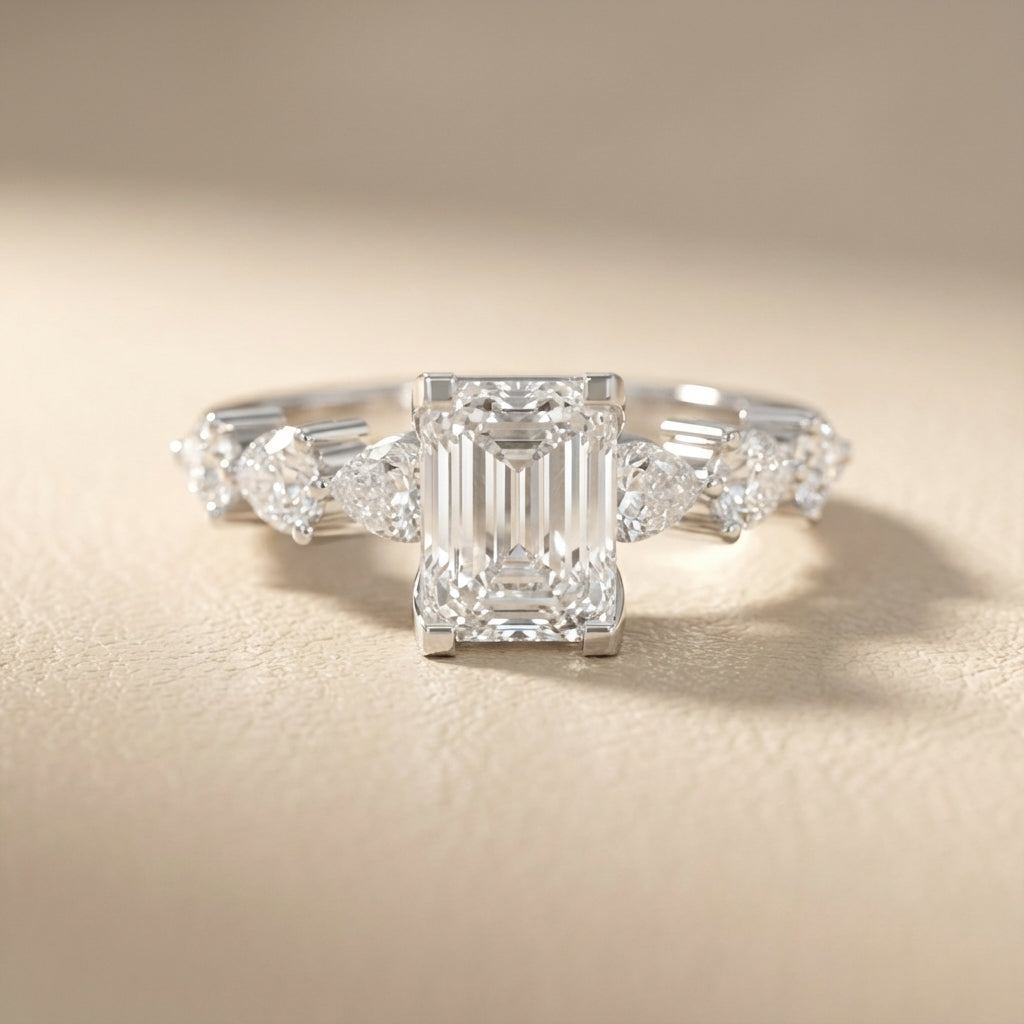 Emerald Cut Lab Grown Diamond Engagement Ring with Marquise and Pear Side Stones in Silver