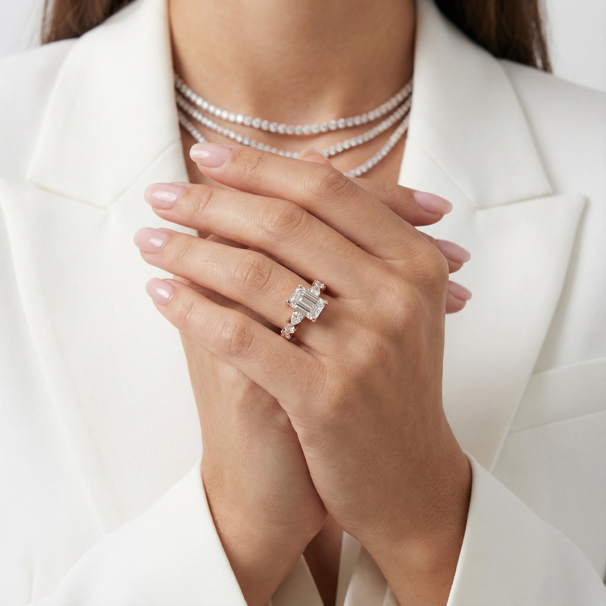 Emerald Cut Lab Grown Diamond Engagement Ring with Marquise and Pear Side Stones in Rose Gold