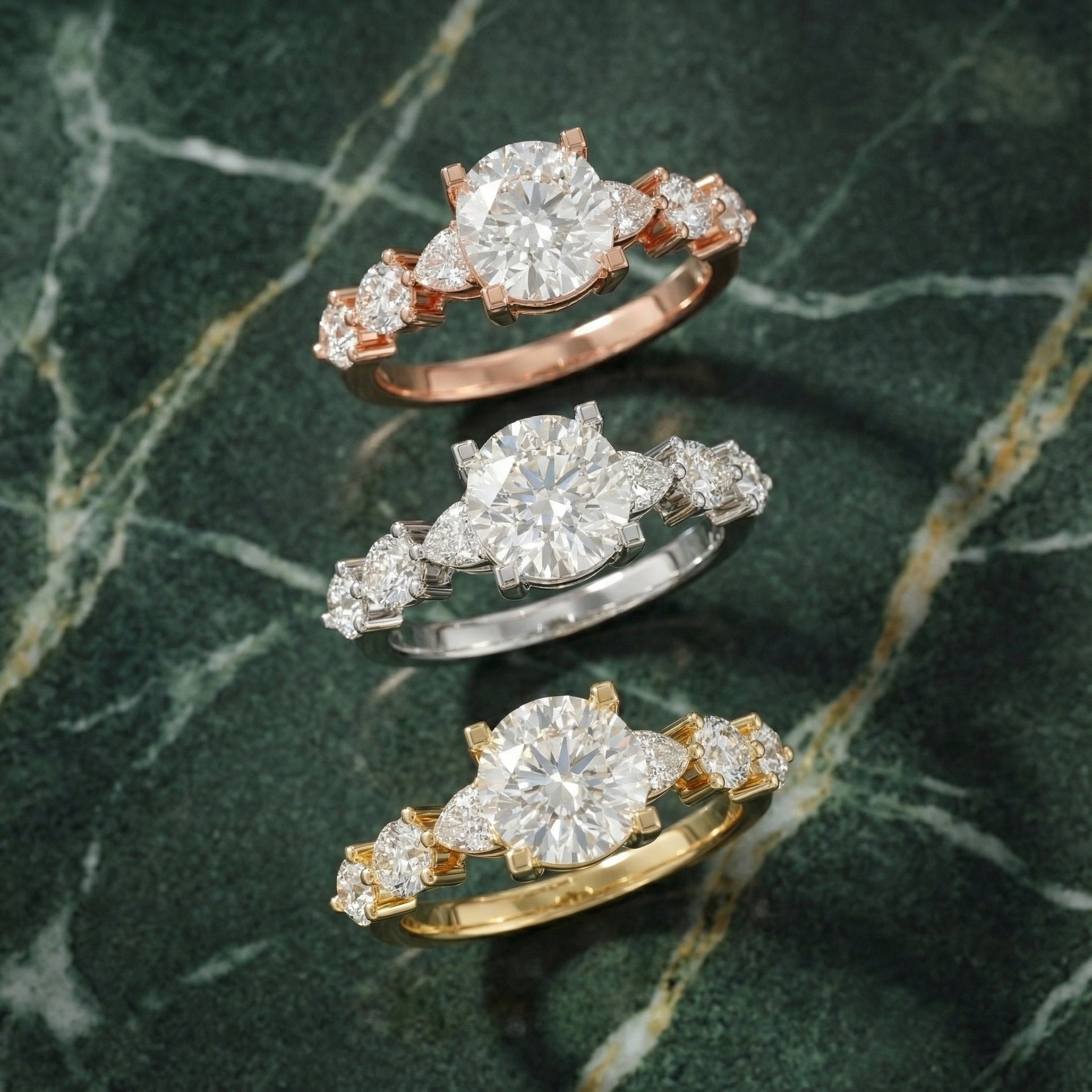 Cushion cut lab grown diamond engagement ring with marquise and pear side stones set in enduring platinum.