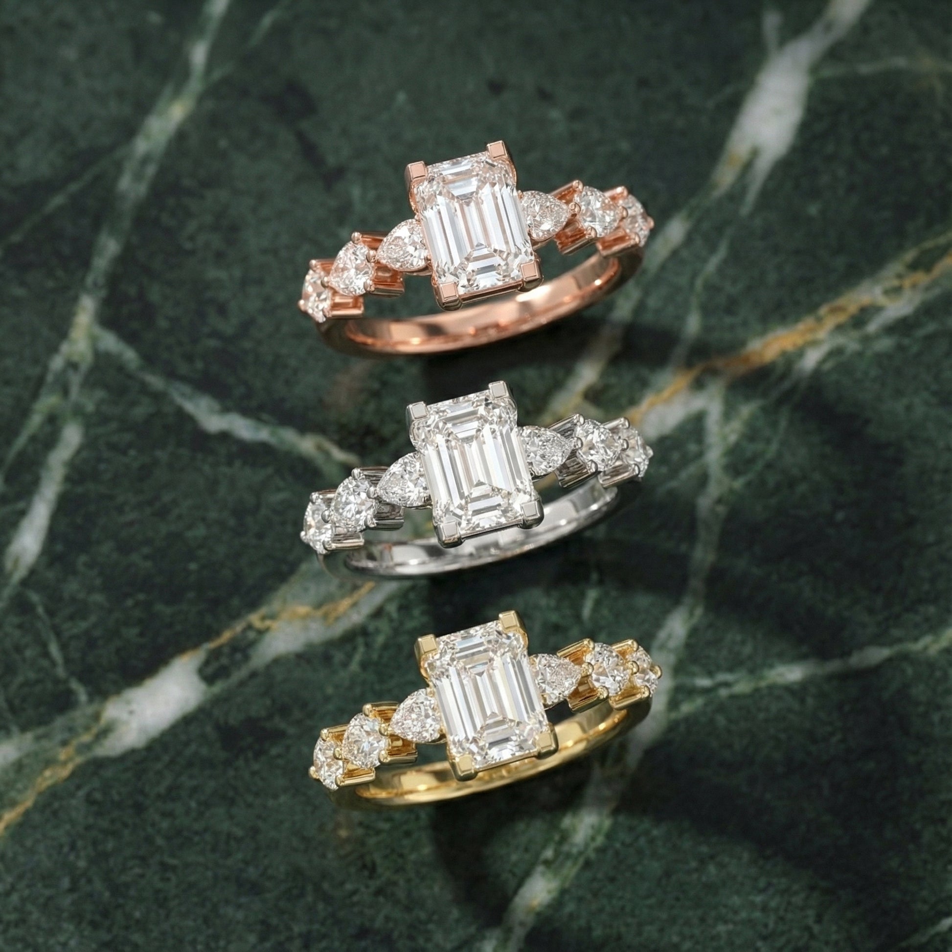 Emerald Cut Lab Grown Diamond Engagement Ring with Marquise and Pear Side Stones in Yellow Gold