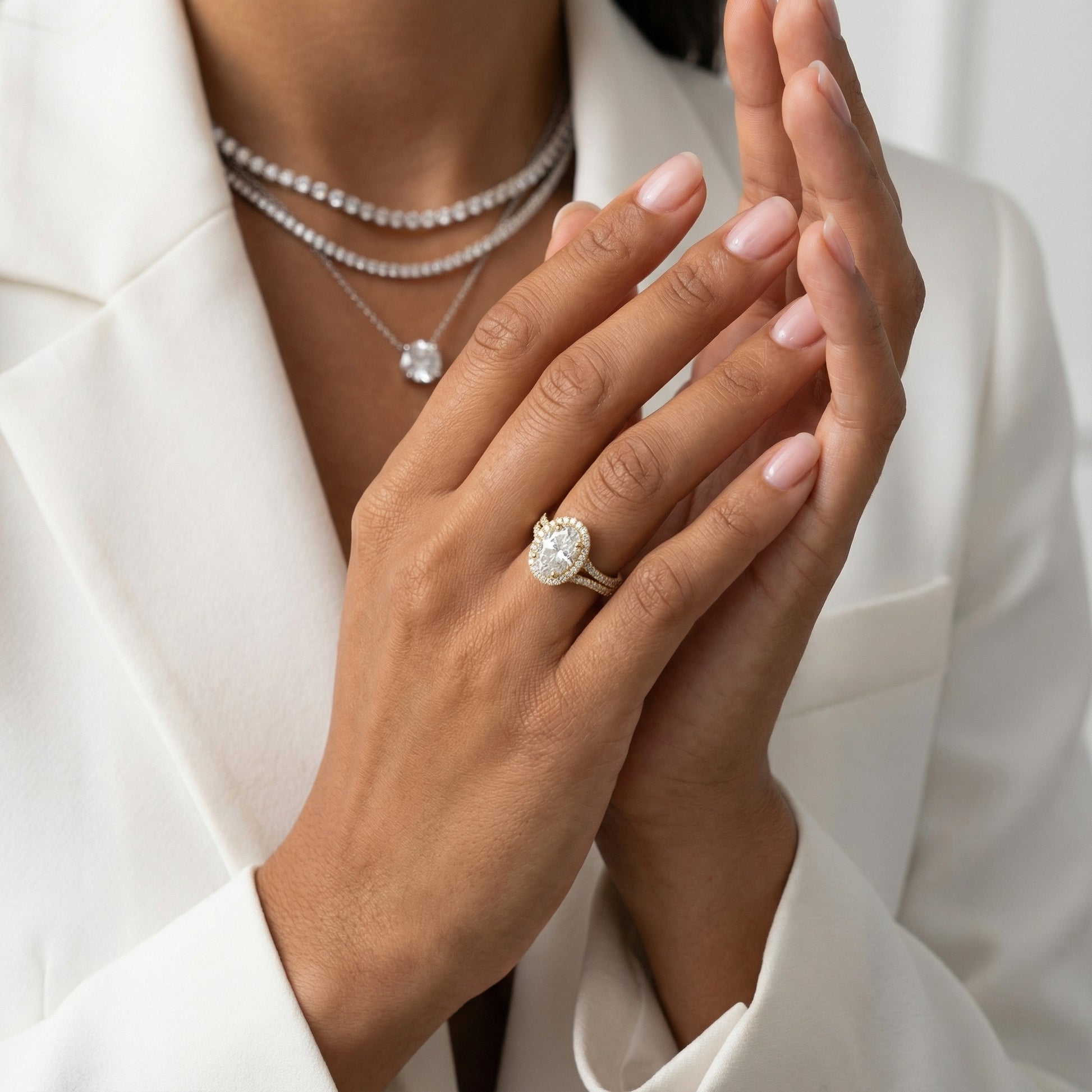 Oval Cut Lab Grown Diamond Halo Engagement Ring with Split Shank in Yellow Gold