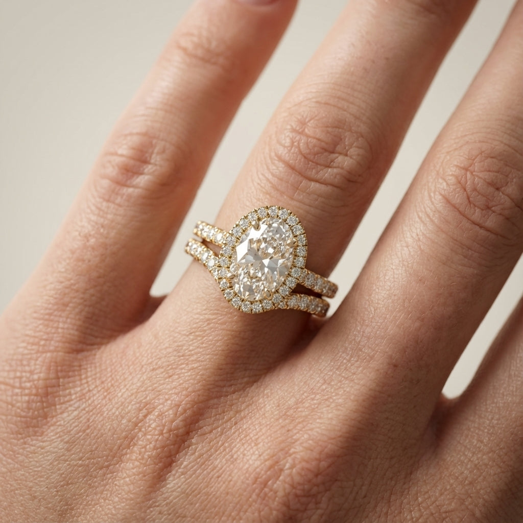 Oval Cut Lab Grown Diamond Halo Engagement Ring with Split Shank in Yellow Gold