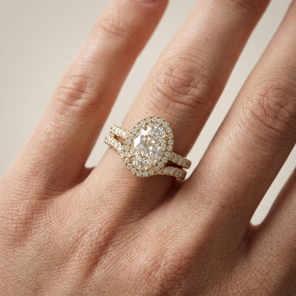 Oval Cut Lab Grown Diamond Halo Engagement Ring with Split Shank in Yellow Gold