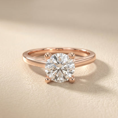 Round Cut Lab Grown Diamond Engagement Ring in Rose Gold showing side profile with hidden detail