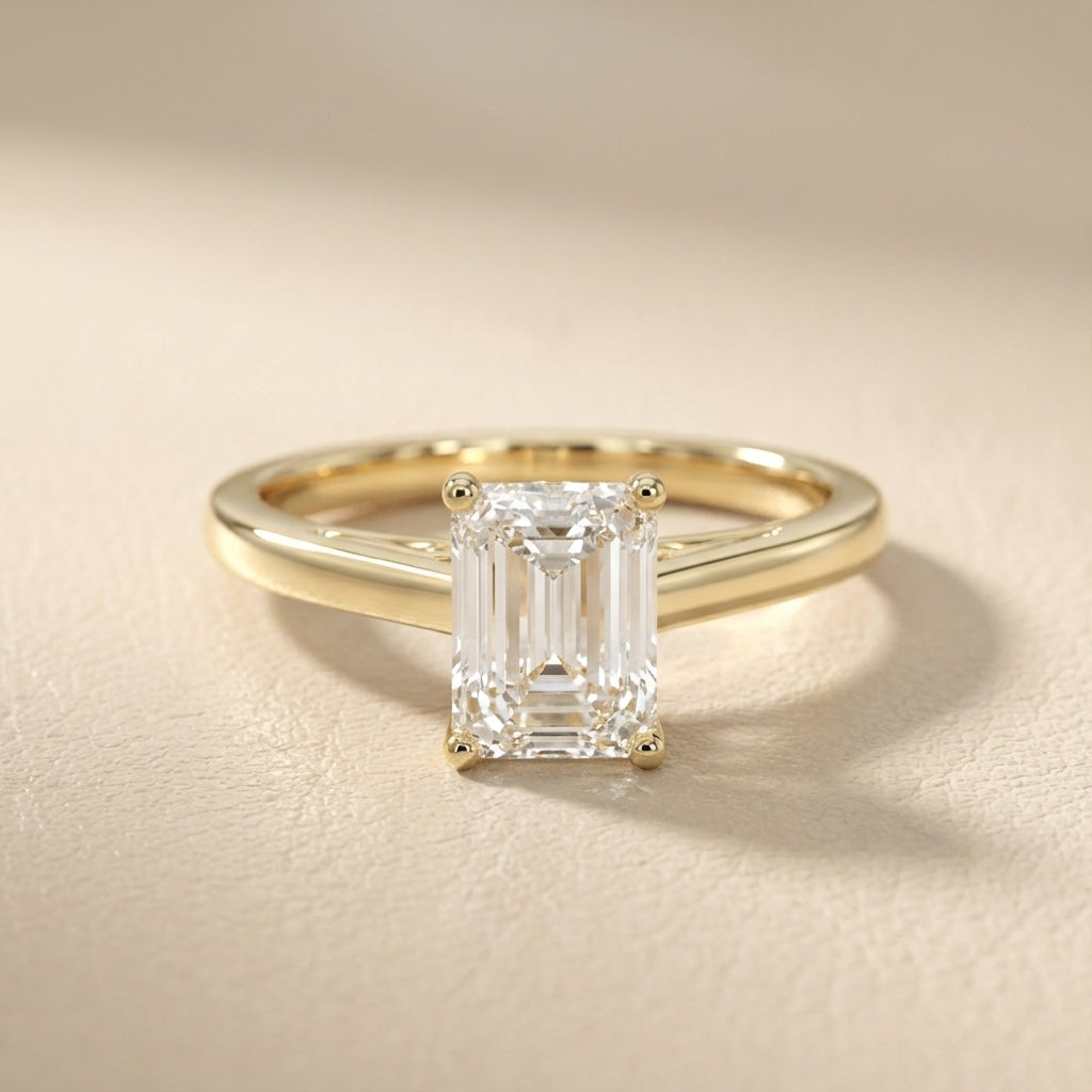 Emerald Cut Lab Grown Diamond Solitaire Engagement Ring in Yellow Gold showing secret under-gallery
