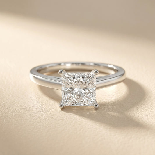 Princess Cut Lab Grown Diamond Solitaire Engagement Ring in Silver with hidden scroll detail.