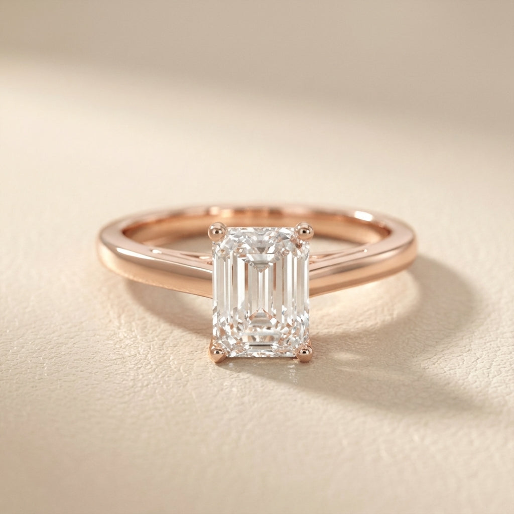 Emerald Cut Lab Grown Diamond Solitaire Engagement Ring in Rose Gold showing side profile with hidden detail