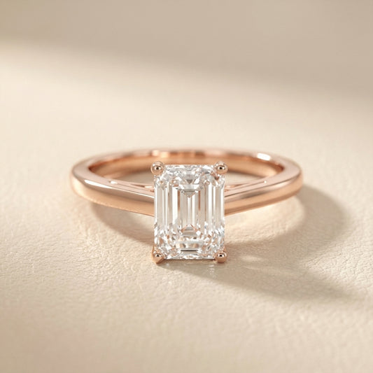 Emerald Cut Lab Grown Diamond Solitaire Engagement Ring in Rose Gold showing side profile with hidden detail