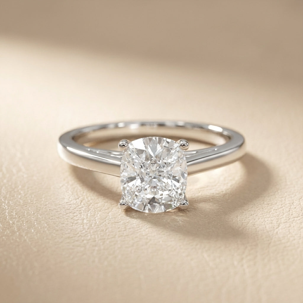 Platinum Cushion Cut Lab Grown Diamond Solitaire Engagement Ring profile view.