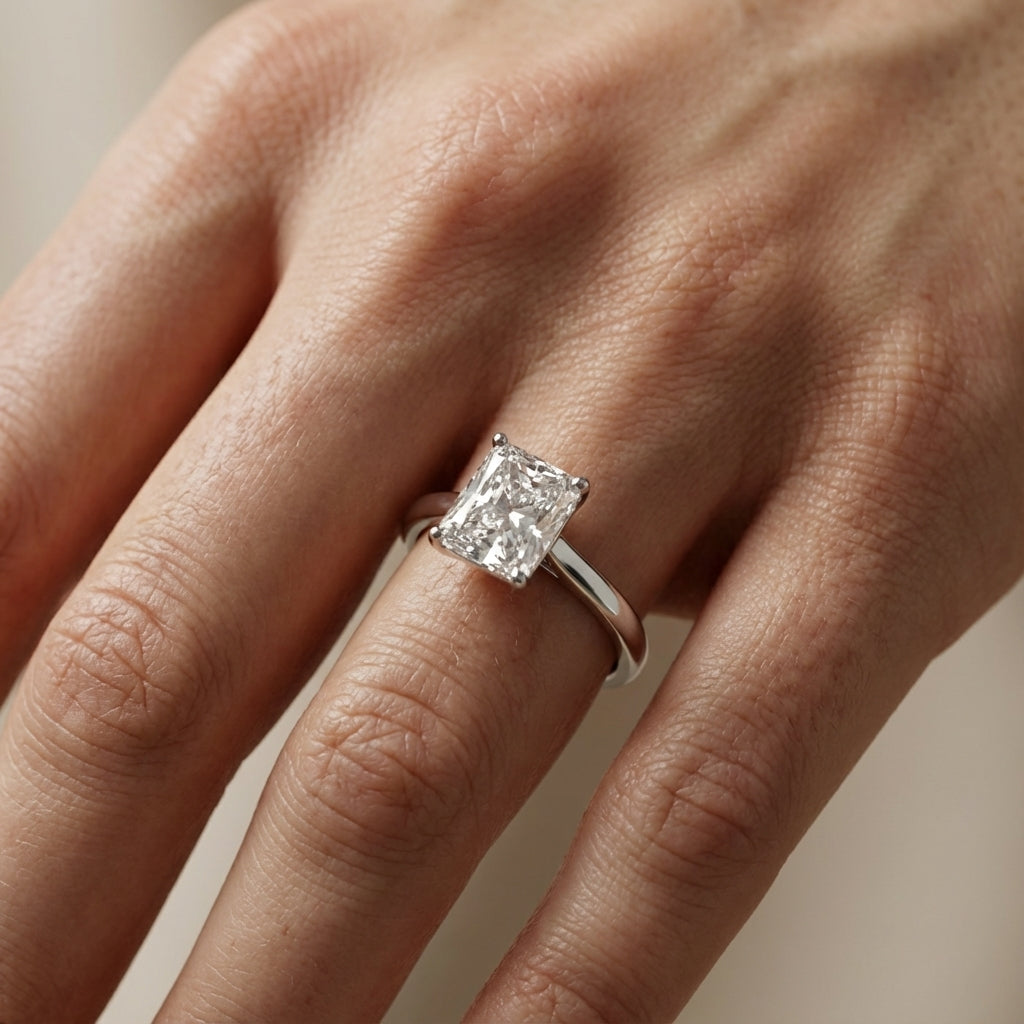 Radiant Cut Lab Grown Diamond Solitaire Engagement Ring in Platinum showing hidden gallery