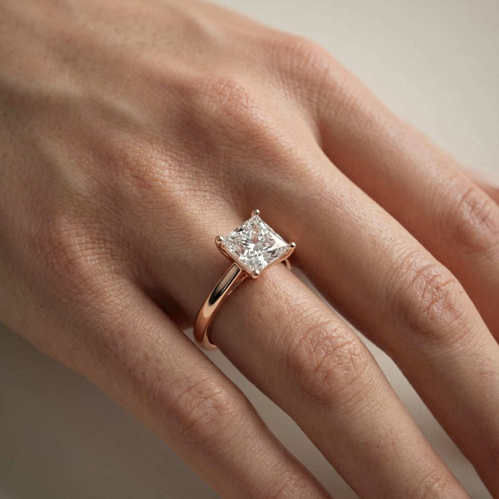 Princess Cut Lab Grown Diamond Solitaire Engagement Ring in Rose Gold showing side profile filigree.