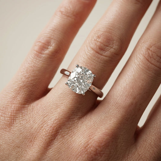 Platinum Cushion Cut Lab Grown Diamond Solitaire Engagement Ring profile view.