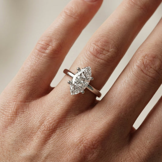 White Gold Marquise Cut Lab Grown Diamond Solitaire Engagement Ring side profile view.