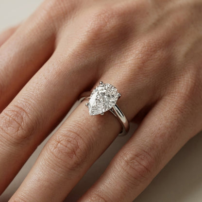 Pear Cut Lab Grown Diamond Solitaire Engagement Ring in Platinum with hidden details