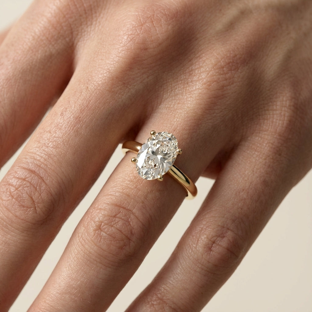 Oval Cut Lab Grown Diamond Solitaire Engagement Ring in Yellow Gold showing hidden side profile detail