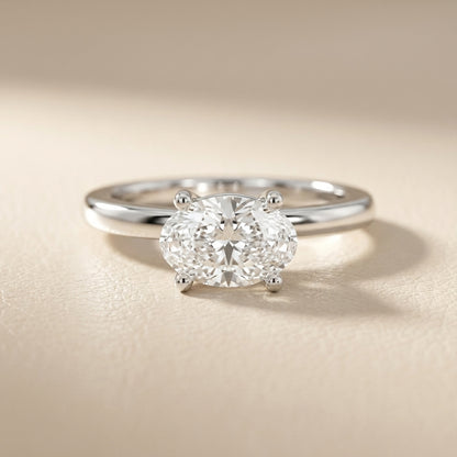 Oval Cut Lab Grown Diamond Engagement Ring in White Gold with chevron under-bezel detail