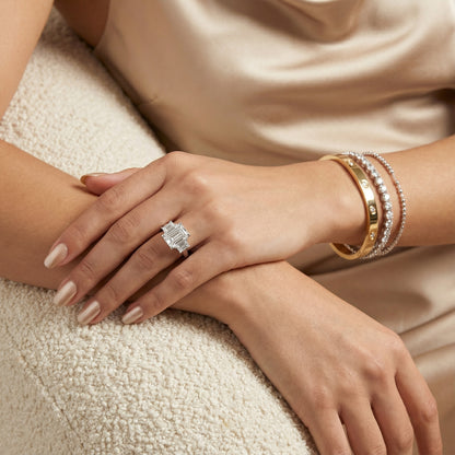 Emerald Cut Lab Grown Diamond Solitaire Engagement Ring in durable Platinum claw setting.