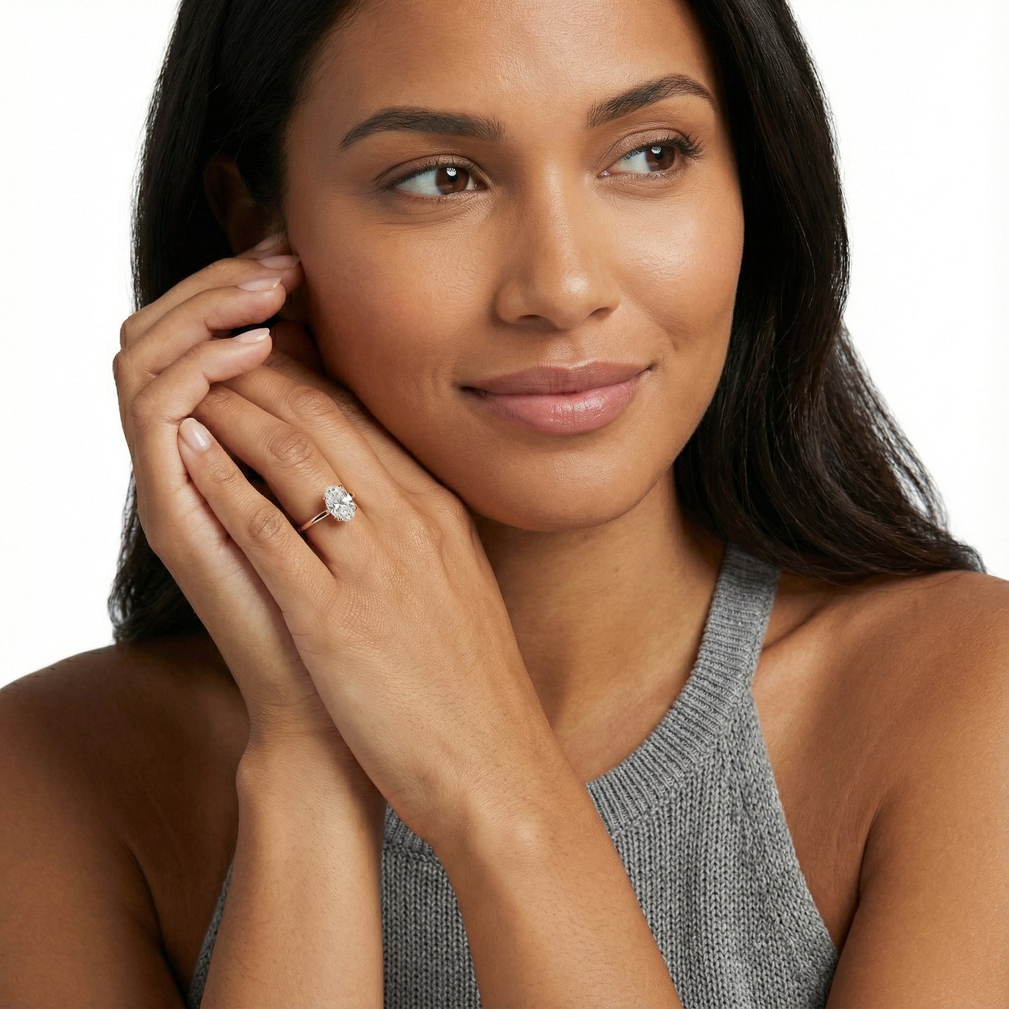 Oval Cut Lab Grown Diamond Engagement Ring in Rose Gold with chevron under-bezel detail