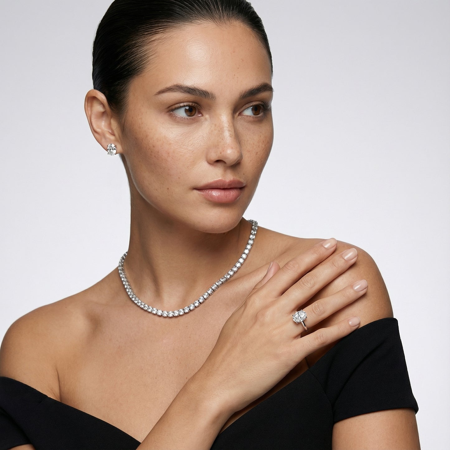 Oval Cut Lab Grown Diamond Engagement Ring in Platinum with chevron under-bezel detail