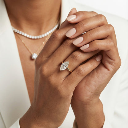 Marquise Cut Lab Grown Diamond Solitaire Engagement Ring in Yellow Gold setting