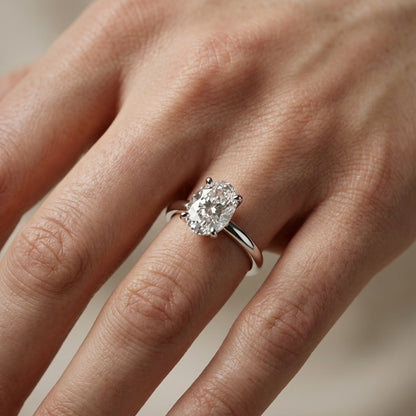 Oval Cut Lab Grown Diamond Engagement Ring in White Gold with chevron under-bezel detail