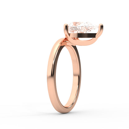Pear Cut Lab Grown Diamond Solitaire Engagement Ring in Rose Gold with claw prongs and chevron basket.